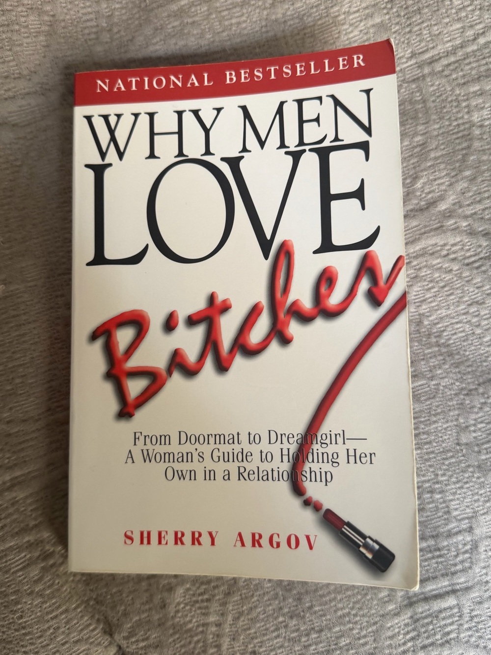 Why Men Love Bitches by Sherry Argov — White & Red Paperback Book